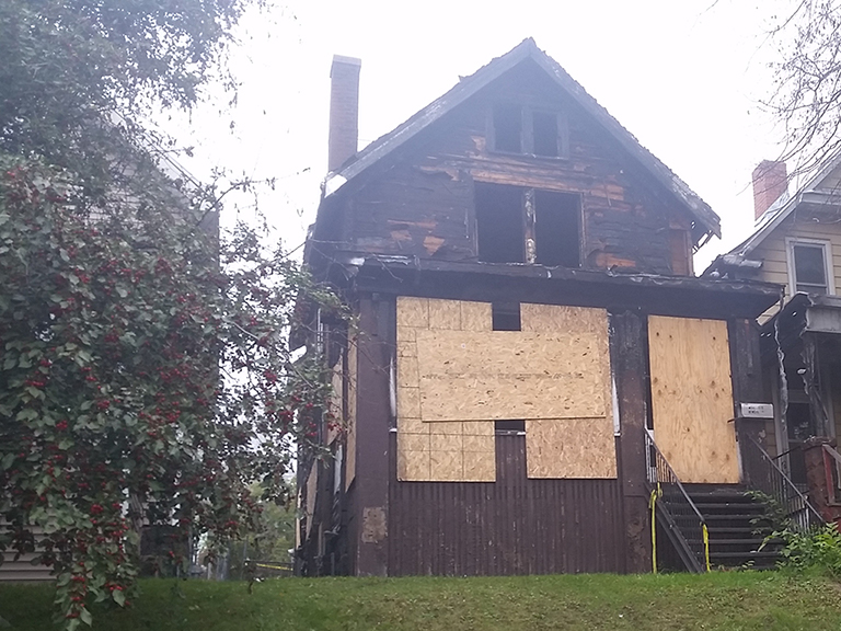 Boarded up house in Lincoln Park neighborhood