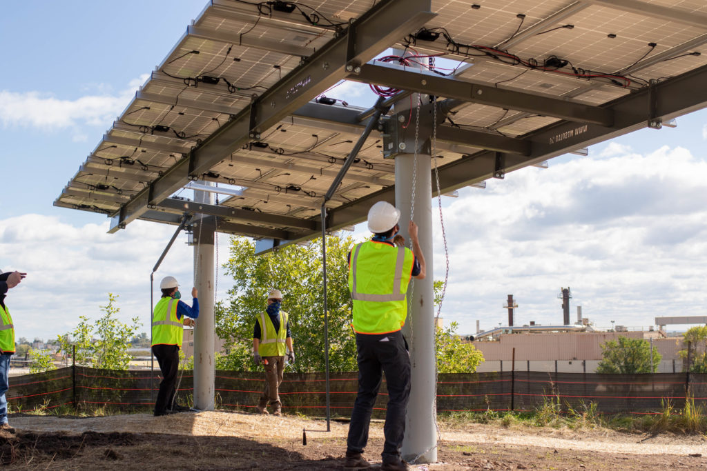 Raising the first panel on the Lincoln Park Solar Garden