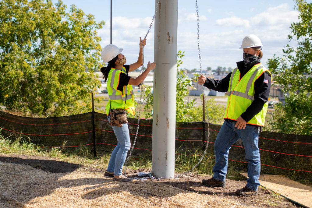 Raising the first panel on the Lincoln Park Solar Garden