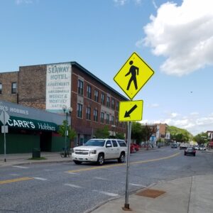 Crosswalk sign on Superior St in Lincoln Park on a sunny day