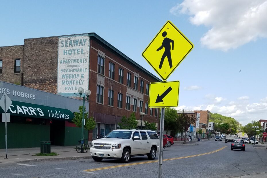 Crosswalk sign on Superior St in Lincoln Park on a sunny day