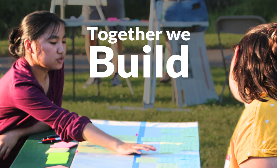 Two people sit across from each other at a picnic table covered in papers and plans. Text reads "Together we build," the Eco3 logo is at the bottom left.