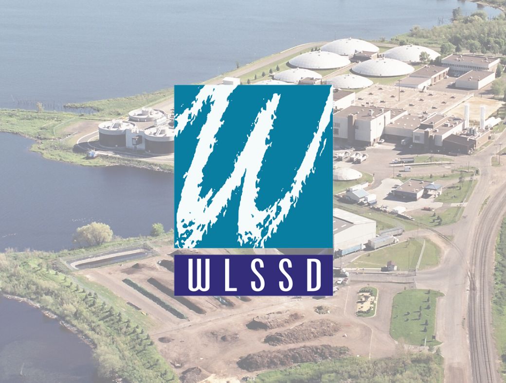 WLSSD logo over a drone shot of their facilities
